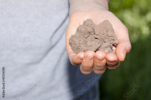 Dry soil in hand