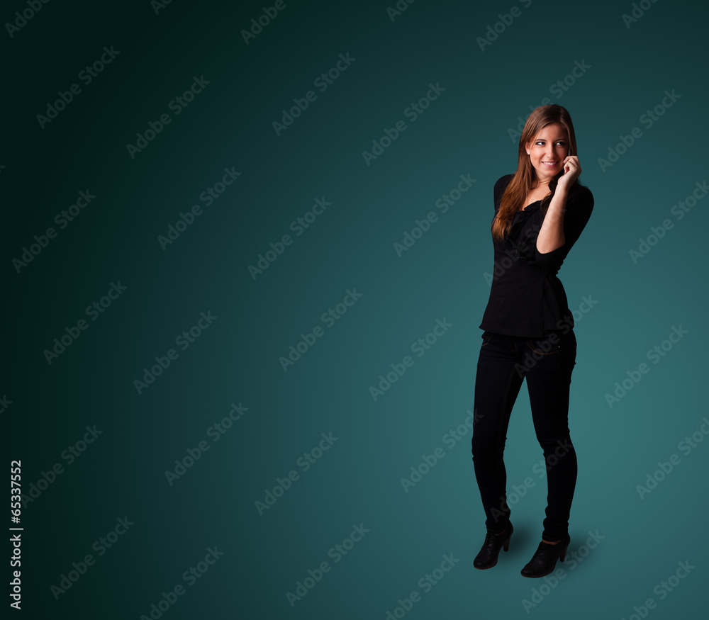 Young woman making phone call with copy space Young woman making phone call with copy space