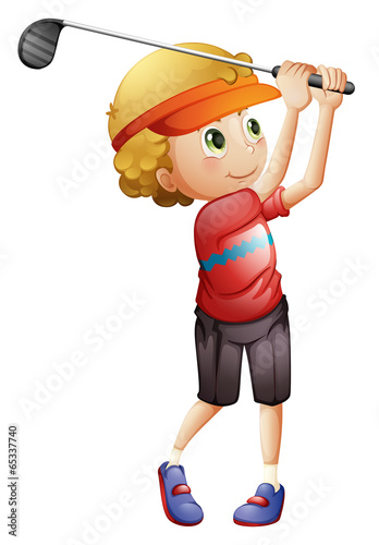 A boy golfing