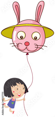 A cute little girl holding a bunny balloon