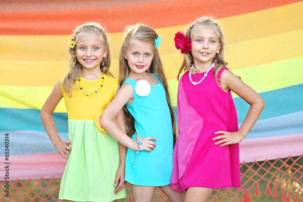 portrait of three little girls in summer portrait of three little girls in summer