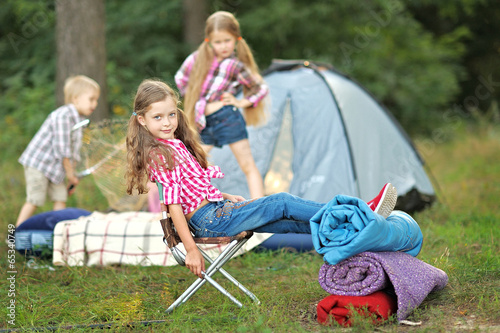Portrait of young children on a camping holiday