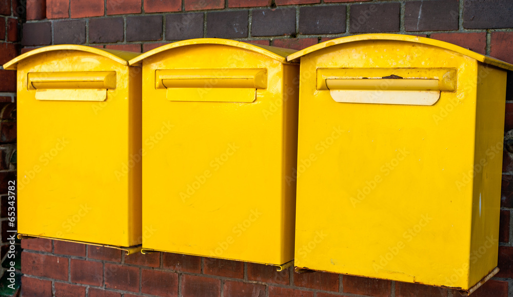 Three yellow mailboxes Stock Photo Adobe Stock