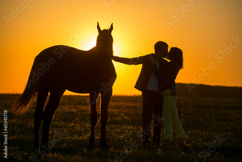 man and woman in horse