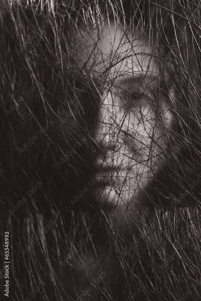 portrait face girl through net in monochrome portrait face girl through net in monochrome