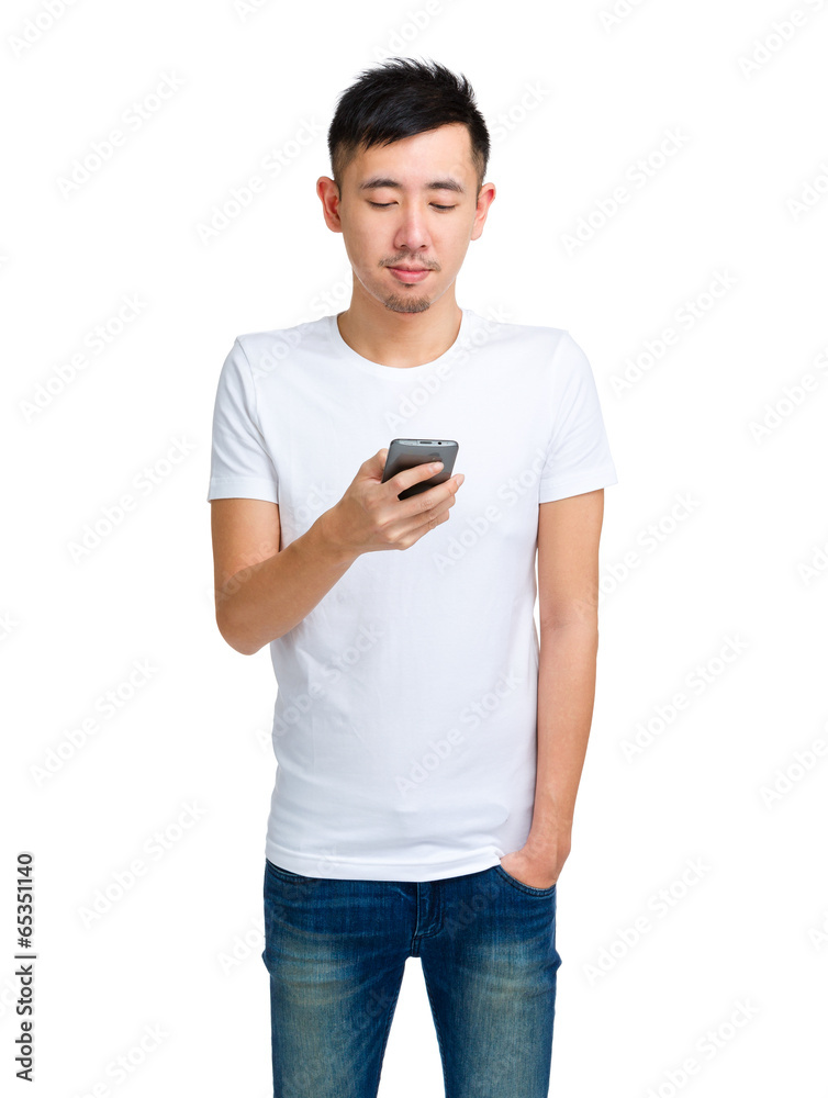 Chinese man using smartphone Chinese man using smartphone