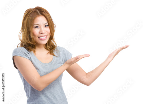 Woman bothing hand showing something