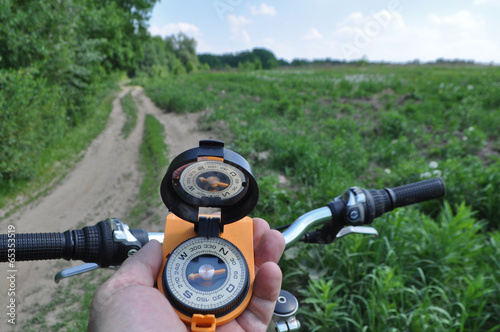 journey by bike with a compass.