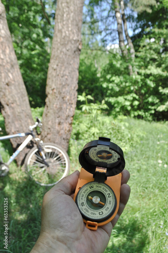 journey by bike with a compass.