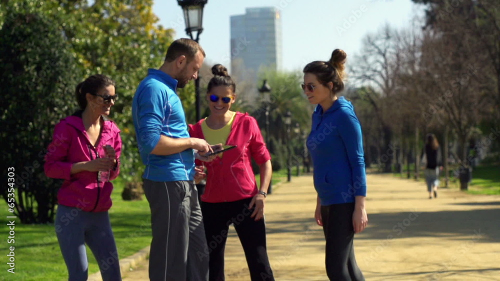 Trainer showing results on tablet, slow motion shot at 240fps, s Trainer showing results on tablet, slow motion shot at 240fps, s