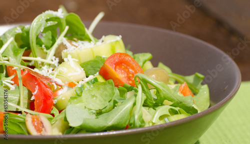 Arugula Salad with tomatoes, olives and parmesan