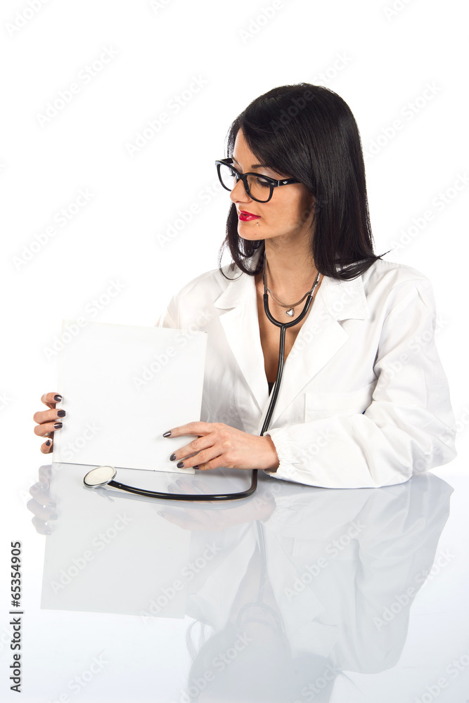 Attractive female doctor with white sign Attractive female doctor with white sign
