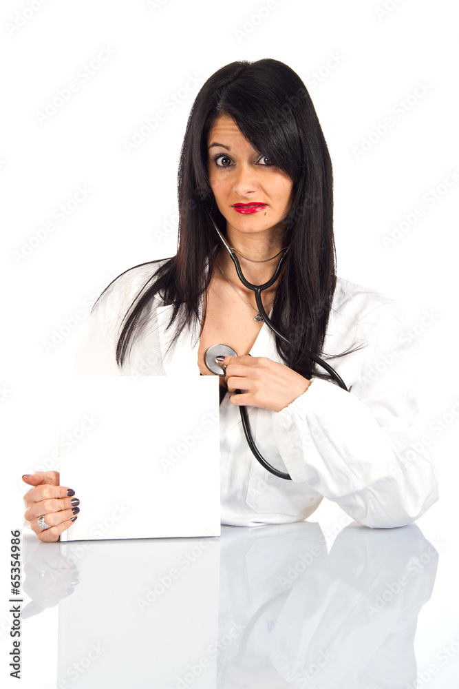 Attractive female doctor with white sign Attractive female doctor with white sign