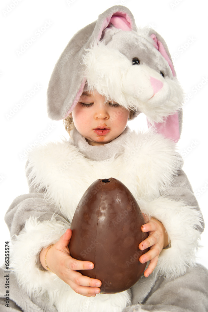 Playing with chocolate easter egg Playing with chocolate easter egg