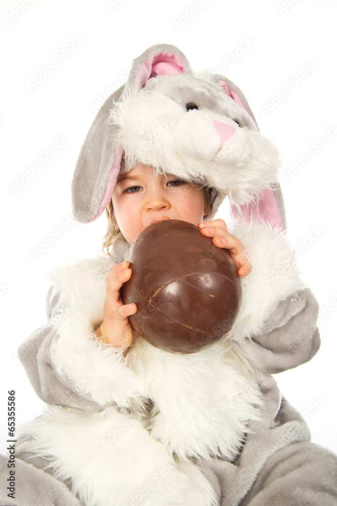 Playing with chocolate easter egg Playing with chocolate easter egg