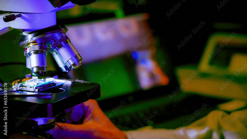 check micro electronic chip under a microscope
