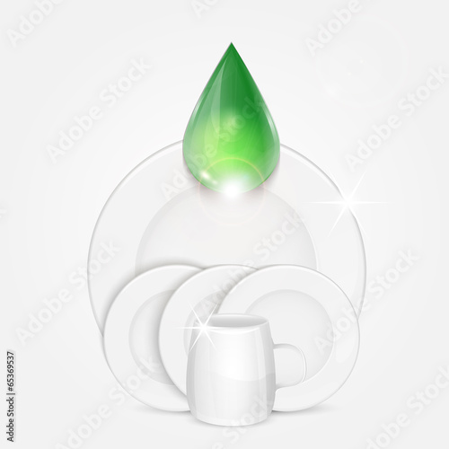 set of clean dishes and green drop.dishwashing liquid on the bac