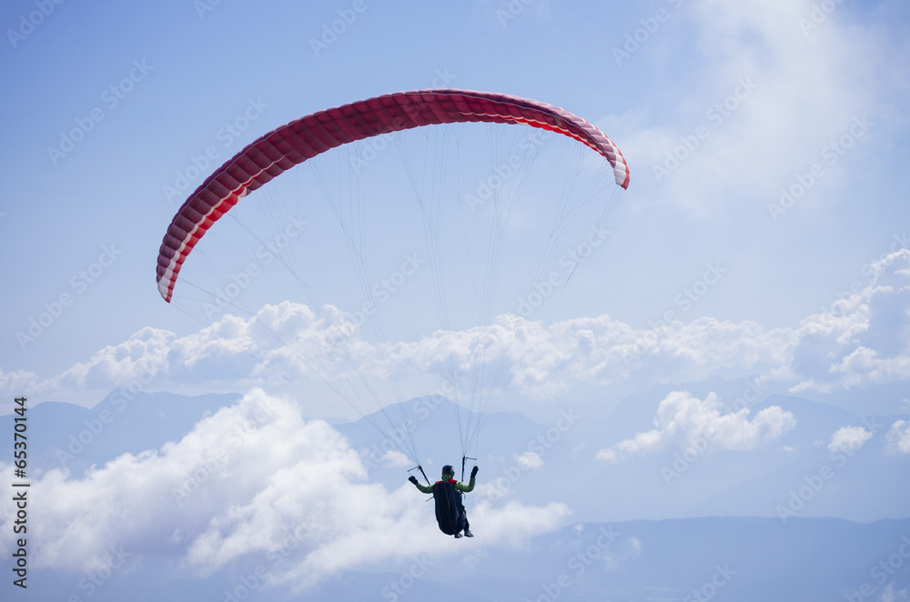 Paraglider over Austrian Alps with Karawanken Range Paraglider over Austrian Alps with Karawanken Range