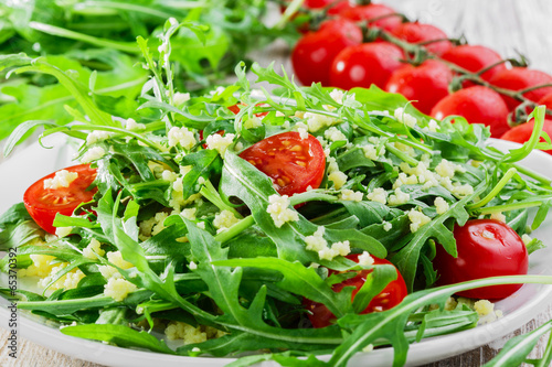 couscous salad with arugula and cherry tomatoes
