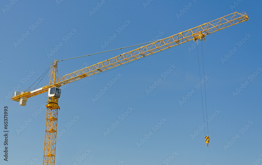Crane on construction site. Space for your text. Crane on construction site. Space for your text.