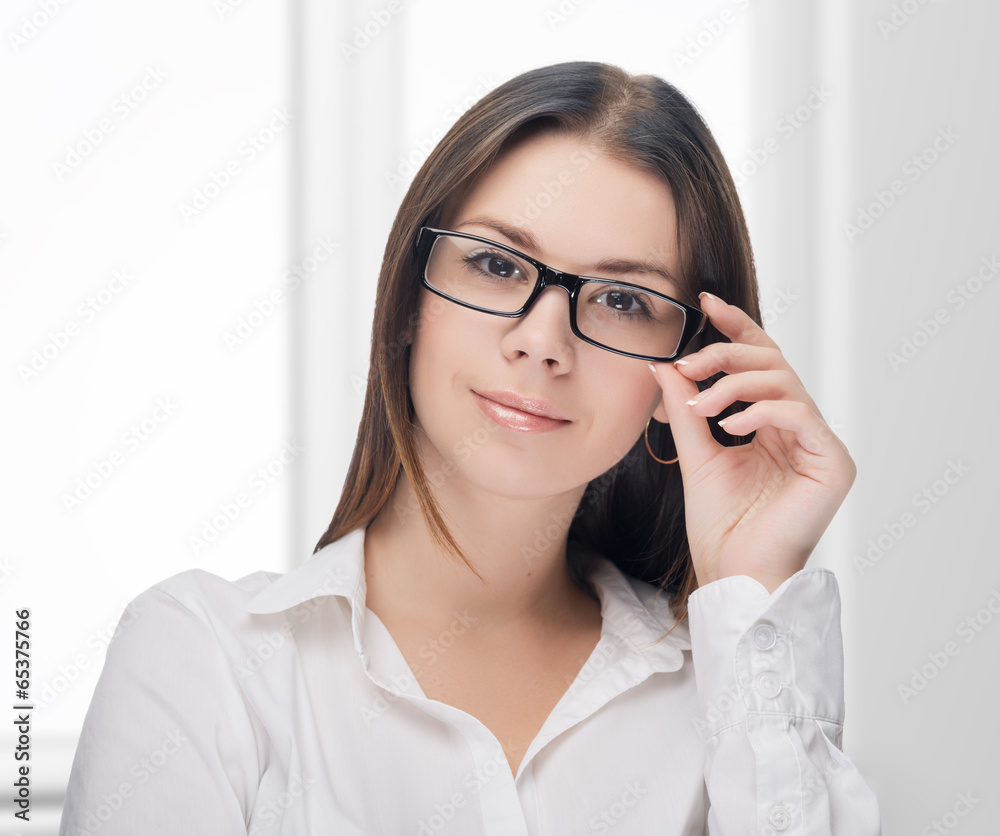 Young woman secretary at work at the office Young woman secretary at work at the office