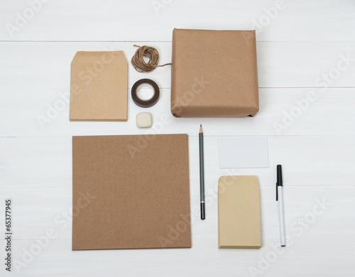 Business Identity Mockup Item Set On White Wooden Desk