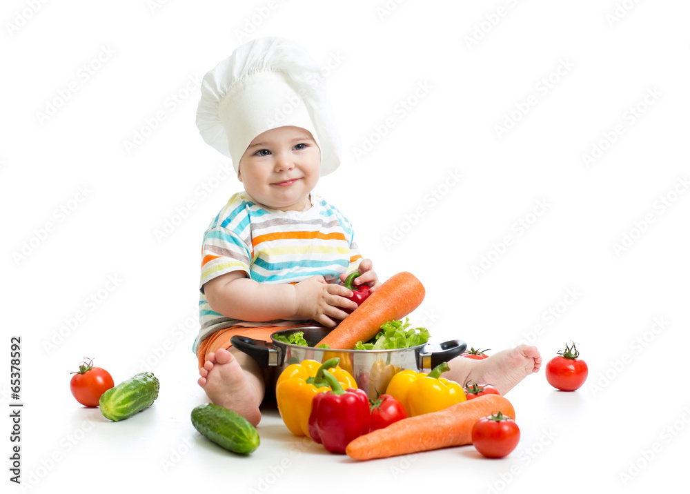 kid chef with healthy food vegetables kid chef with healthy food vegetables