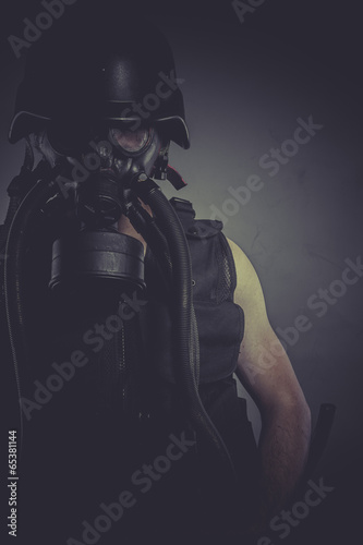 Safe nuclear and toxicological disaster ,man with gas mask