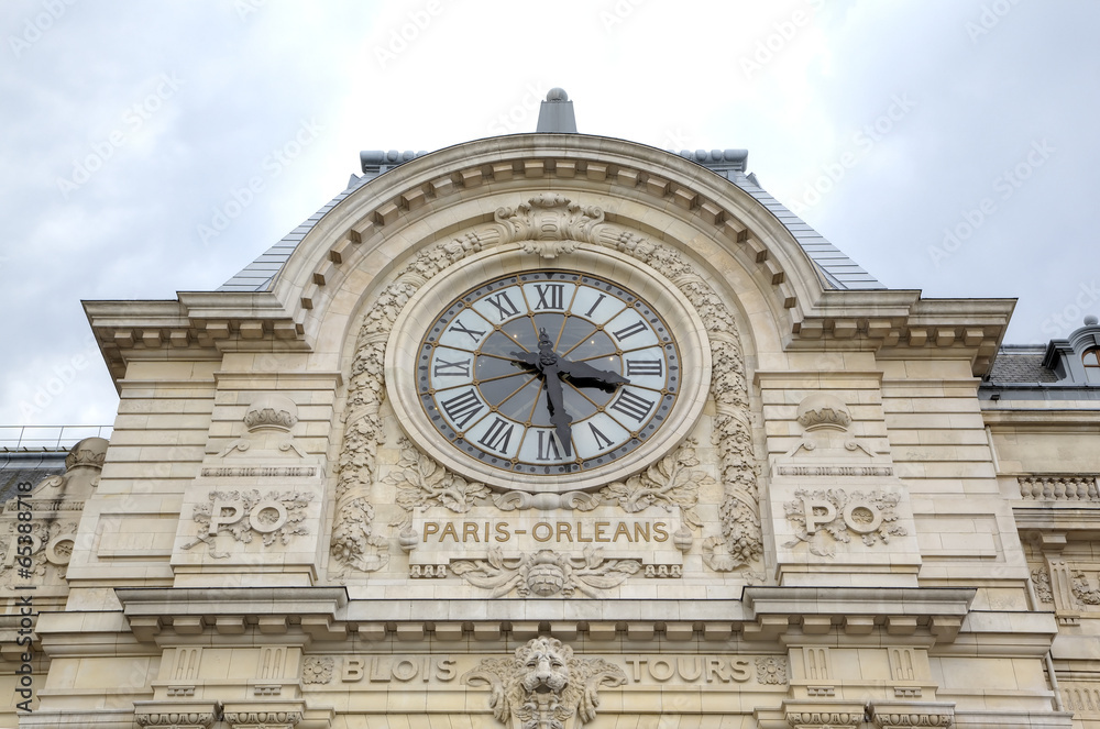 Clock at Musee d'Orsay - old railway station. Paris, France