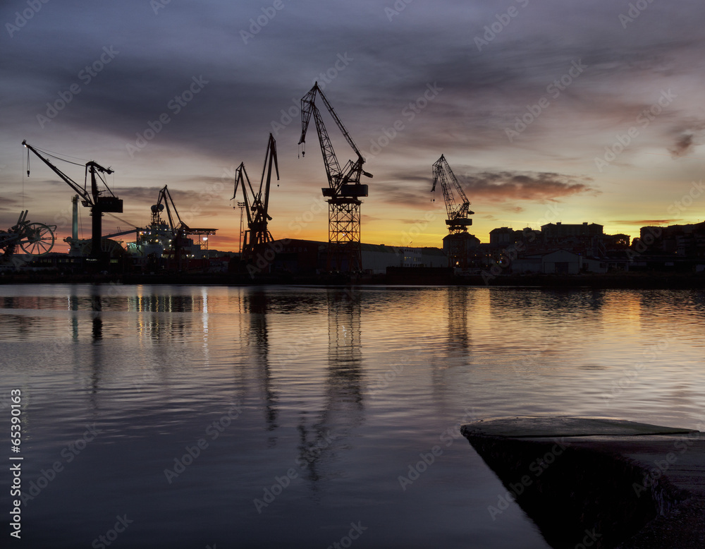 Obraz premium Shipyard at dusk.