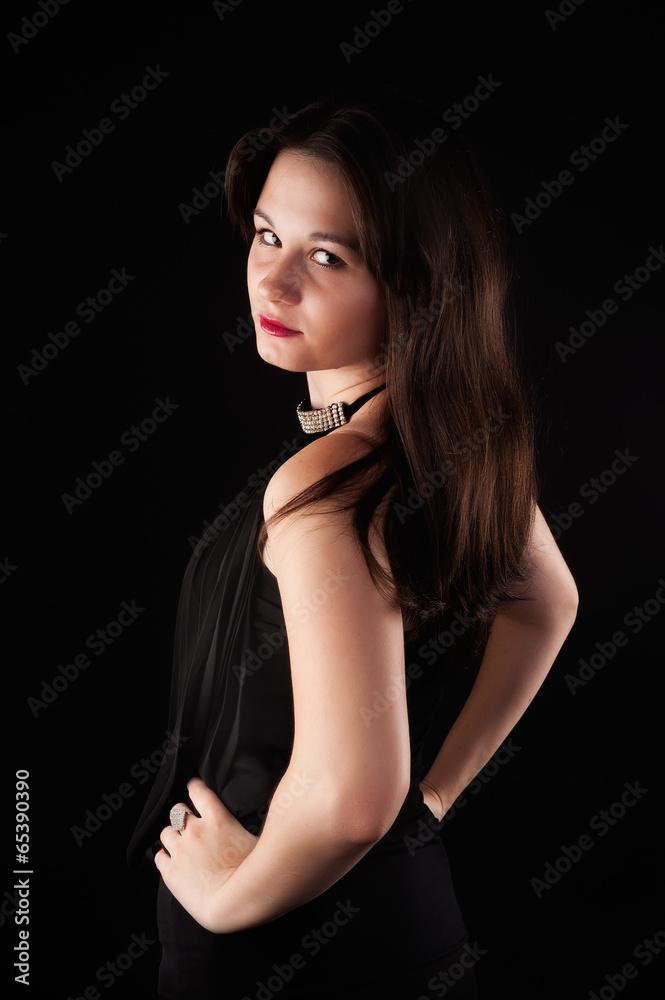 glamorous young woman in black