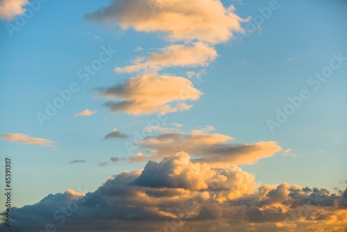 Evening sky with fluffy clouds