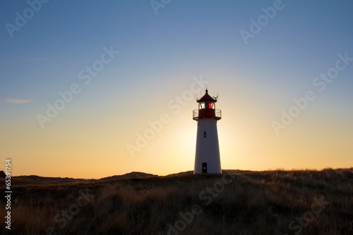 Backlit lighthouse 1