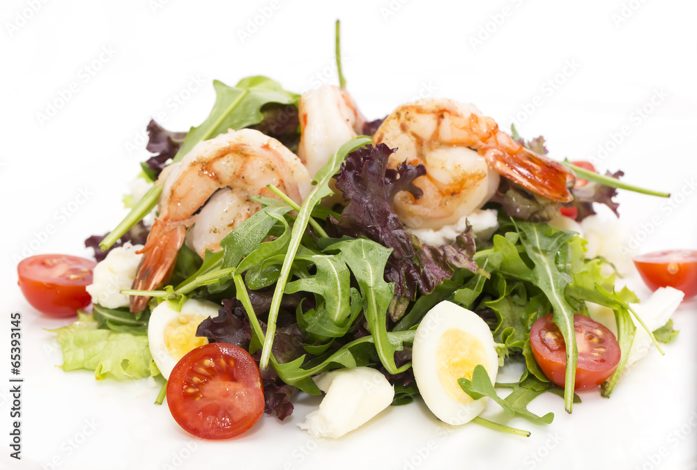 shrimp salad and greens on a white background shrimp salad and greens on a white background