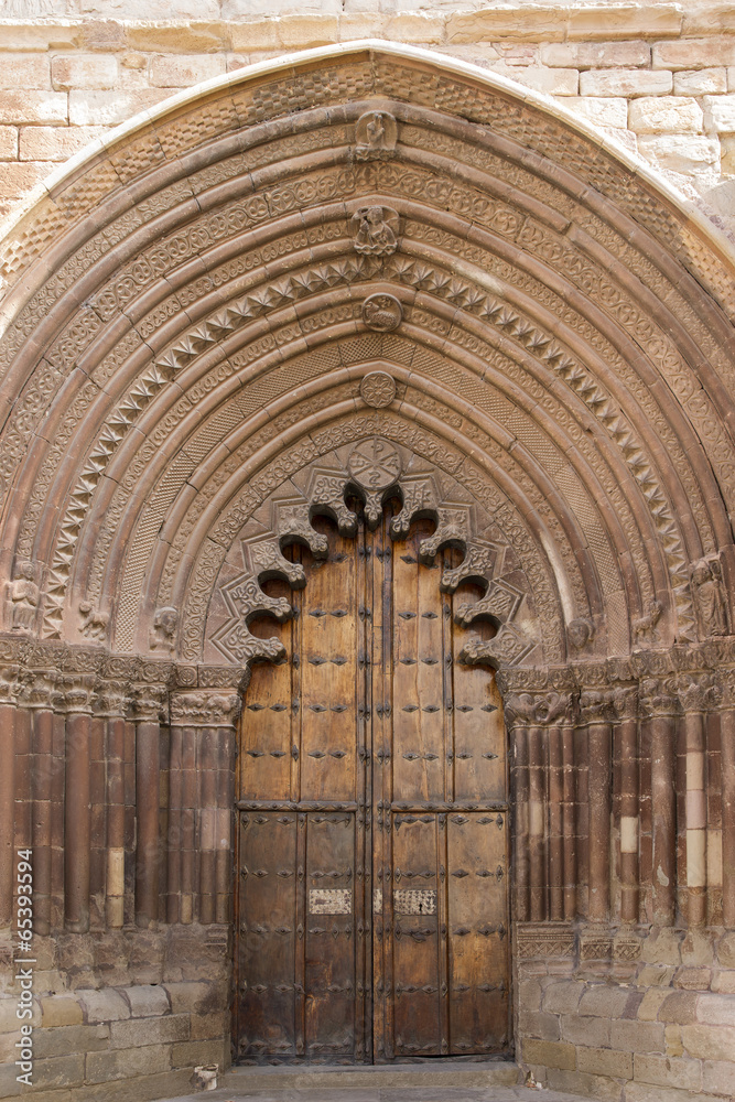 Door of San Román Church, Cirauqui. Navarre. Spain.