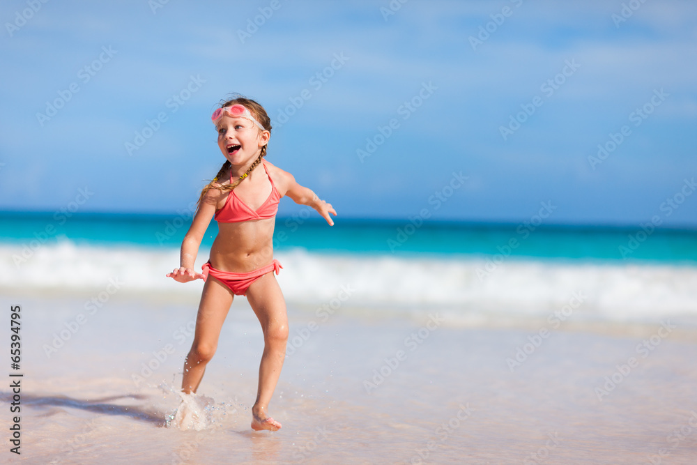 Adorable little girl at beach