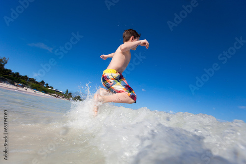 Boy playing in a water