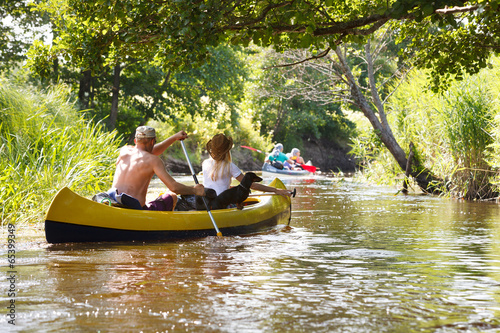 People boating on river