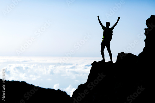 Success man silhouette, backpacker in mountains © blas