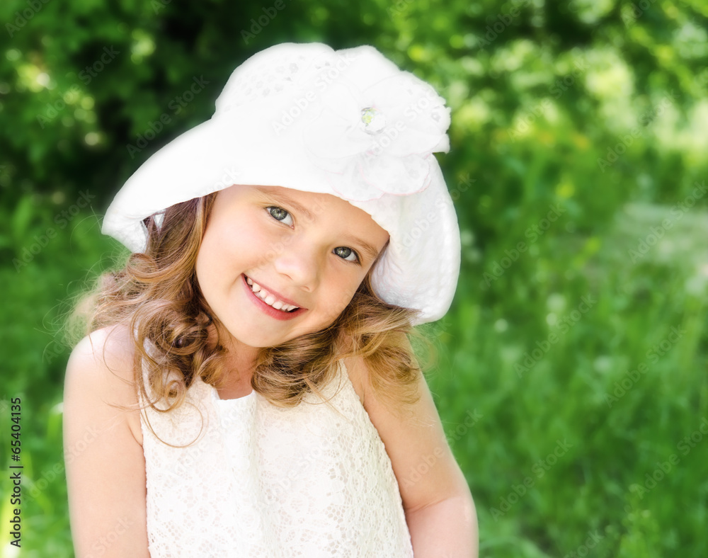Fototapeta premium Portrait of adorable smiling little girl