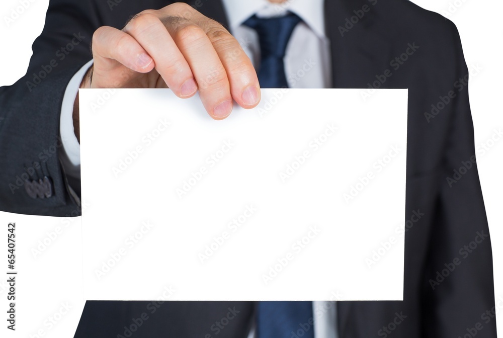 Mature businessman showing blank card Mature businessman showing blank card