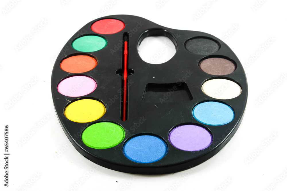 black art palette with paint and brushes isolated on whi black art palette with paint and brushes isolated on whi