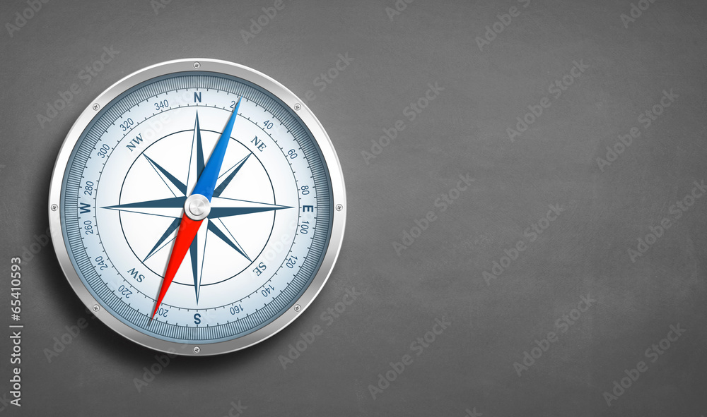 Kompass mit grauem Hintergrund Kompass mit grauem Hintergrund