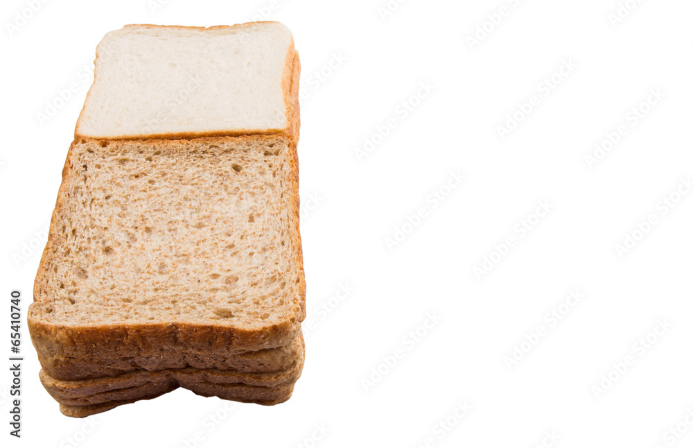 Whole Wheat Bread and Sandwich Bread Over White Background
