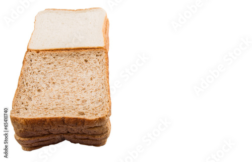 Whole Wheat Bread and Sandwich Bread Over White Background