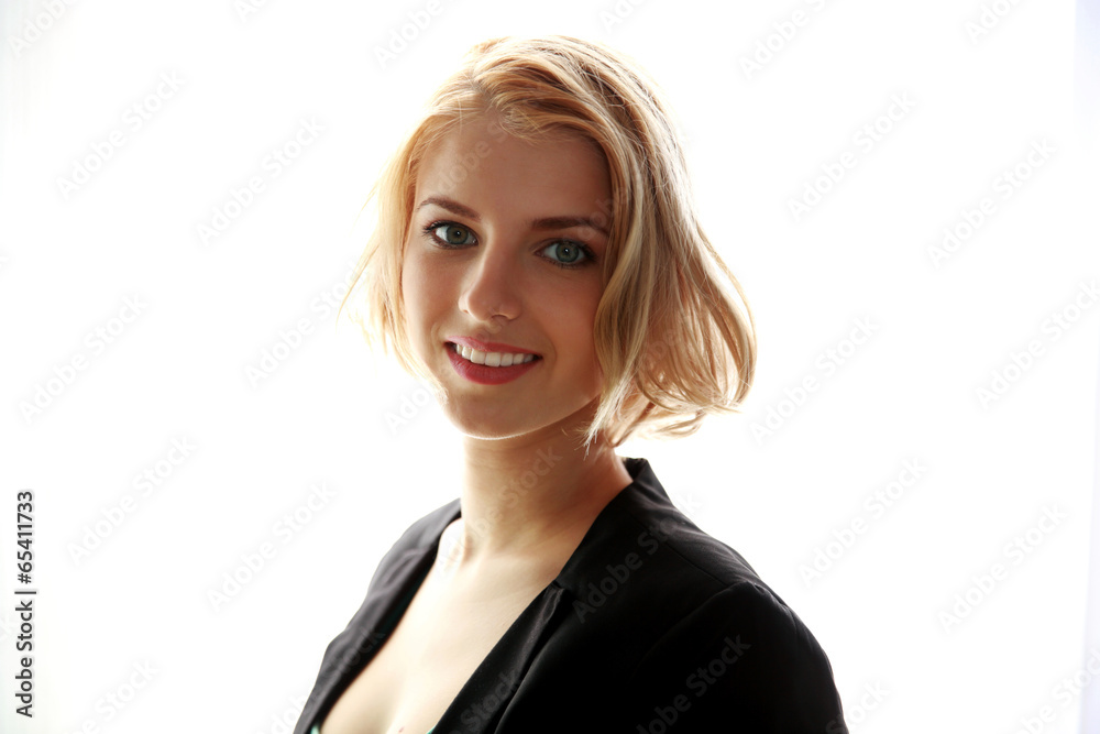 Portrait of a young happy woman over white background Portrait of a young happy woman over white background
