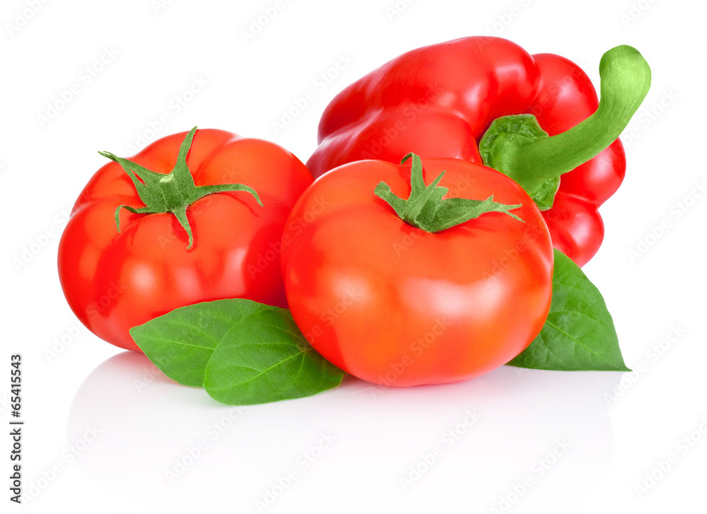 Two tomatoes, Sweet Red Peppers and leaves isolated on a white b Two tomatoes, Sweet Red Peppers and leaves isolated on a white b