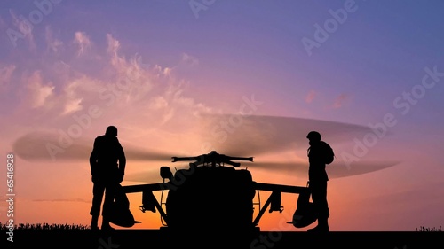 Black Hawk Helicopter Rising In The Sunset