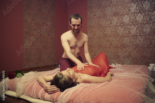 Woman massage in tantra studio photo