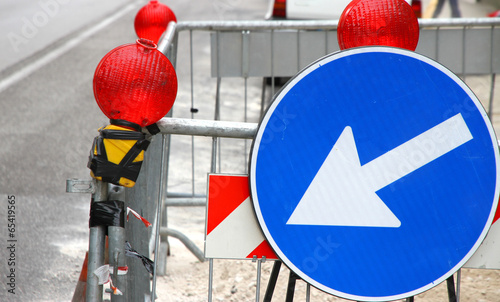 white arrow of roadwork during an excavation in roadway